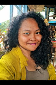 Gladhys E. Syahutari