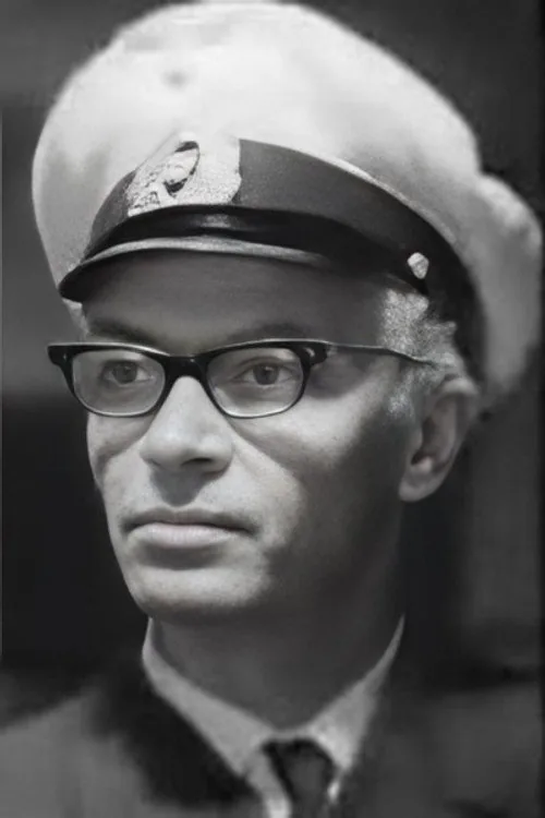 Л. Апинис